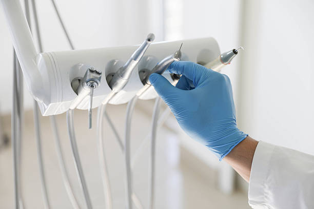 Professional Root Canal Treatment technician working in Kansas City, KS